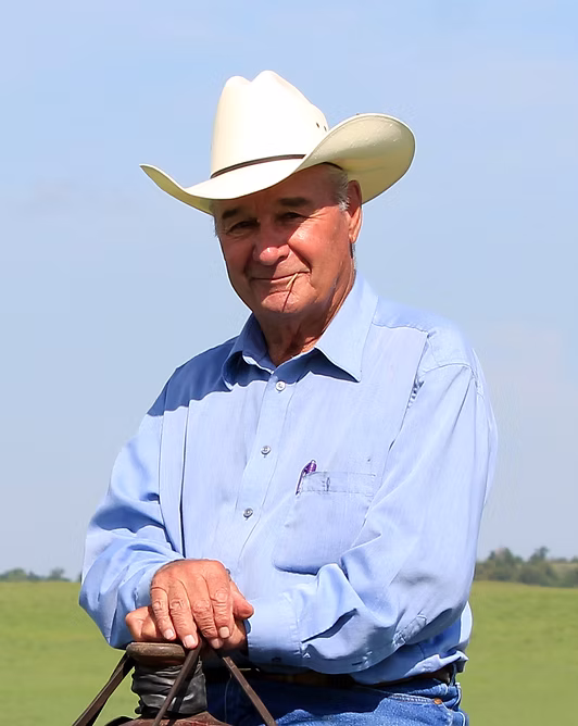 "Buck Gehrt showcasing durable livestock fencing solutions, including cattle pens and continuous fence panels, designed for long-lasting performance with tough bar fence materials."